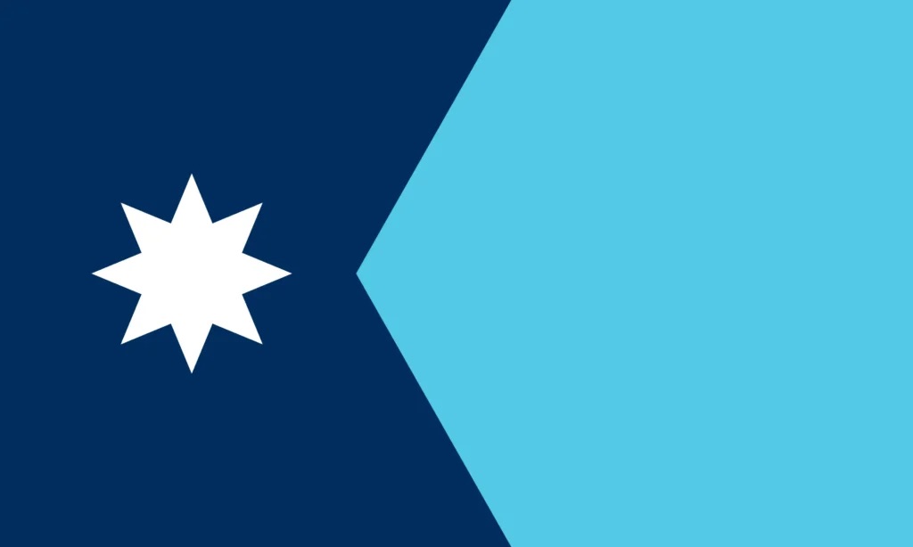 The Minnesota state flag, a white eight-pointed Dakota star on a chevron-shaped dark blue field meant to evoke the shape of the state; the remainder of the flag a robin’s-egg blue.